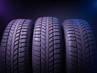 Durable car tires for winter driving, ready for the cold season ahead, offering safety and performance on snowy roads, perfect for automotive ads