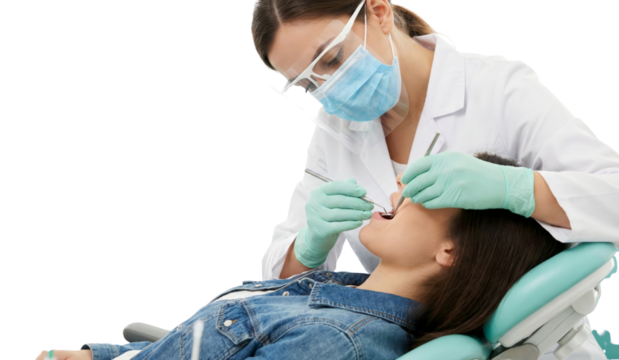 Professional woman dentist providing specialized dental care to a young female patient with