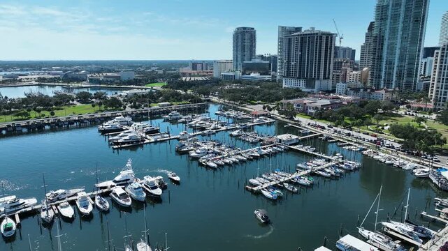 Docked Boats Over St. Petersburg Municipal Marina And The Downtown Waterfront Area In Florida, USA. Aerial Drone Shot