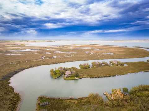 casoni, fisherman house in  marano lagoon, aerial view, friuli venezia giulia, italy