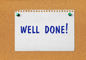 An advertisement &laquo;Well done&raquo; on a piece of paper attached to a notice board