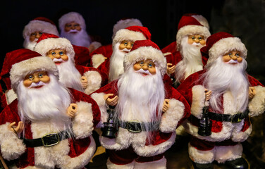 Several Santa Claus figurines