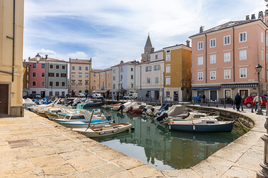 Muggia harbor with colorful houses on the Adriatic coast, Italy