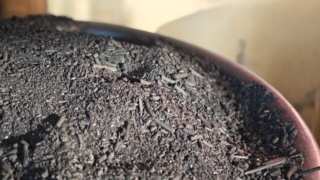 Pile of black charcoal sticks.