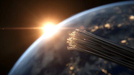 A bundle of glowing fiber optic cables extends towards Earth from space during a vibrant sunrise symbolizing global digital connectivity