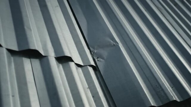 Textured Corrugated Metal Surface with Sunlight and Strong Shadow Pattern