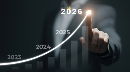 Strategic business planning for 2026 A professional indicates the peak of success and market leadership on a financial chart