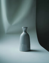 Elegant Gray Ceramic Vase on Smooth Monochrome Background