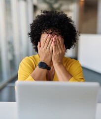 Obraz na płótnie Canvas Portrait of a middle aged mature businesswoman sitting at table with laptop computer in the office, with headache, sick, tired or fatigue while working late . Burnout, stress and deadline concept