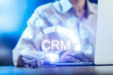 Innovative use of technology in business management with CRM application at a desk