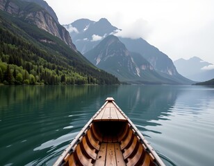 Obraz premium Peaceful Mountain Lake with Wooden Canoe and Verdant Peaks