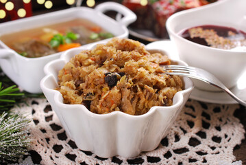 Christmas dishes sauerkraut with mushrooms, red borscht and carp in jelly