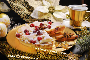 Christmas apple pie with cranberry and coffee