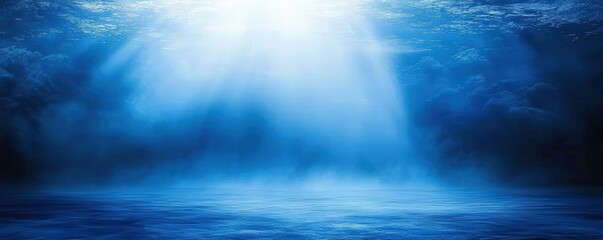 Fototapeta premium Ethereal underwater scene with soft blue light and gentle waves, evoking tranquility and mystery beneath the ocean's surface.