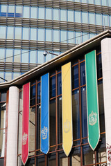 Fototapeta premium TOKYO, JAPAN - November 30, 2025: Hogarts school house banners on 'Harry Potter Plaza' in Akasaka.
