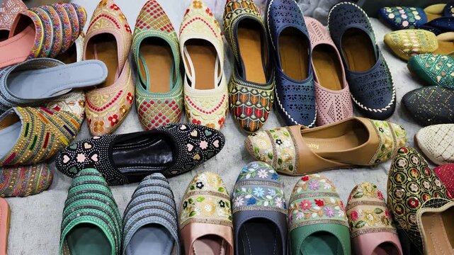 traditional indian mojari shoes featuring colorful embroidery