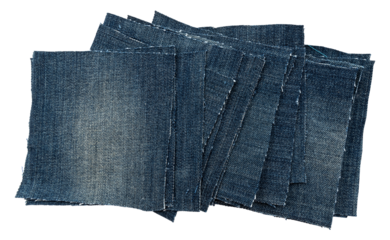 Piece of torn denim on a white background. Denim texture