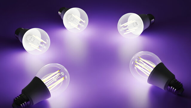 Luminous LED light bulb array casting a radiant glow on a soft purple surface suggesting bright ideas