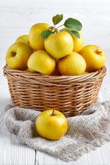 Basket of fresh yellow apples offering healthy food, vertical
