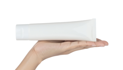 Hand presenting blank white cosmetic cream tube product mock-up isolated on transparent background