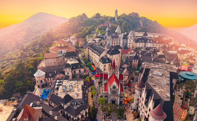 Ba na hills, majestic architecture french village and scenic landscape at sunset, aerial view by...