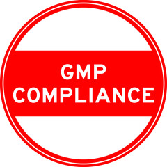 Red color round seal sticker in word GMP (Abbreviation of good manufacturing practice) compliance on white background