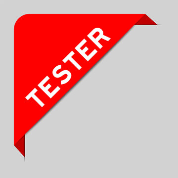 Red color of corner label banner with word tester on gray background