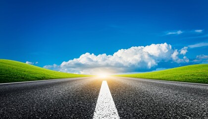 Fototapeta premium Open Road Leading Towards a Bright Sunlit Horizon Under a Blue Sky.