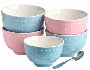 Stacked pink/blue polka-dot bowls with silver spoon