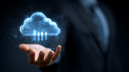 Person holding glowing digital cloud with upward arrows cloud computing technology