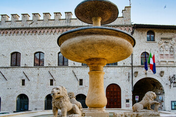 Panorama of the Town Square and the Fountain of the Three Lions in Assisi, Umbria, Italy