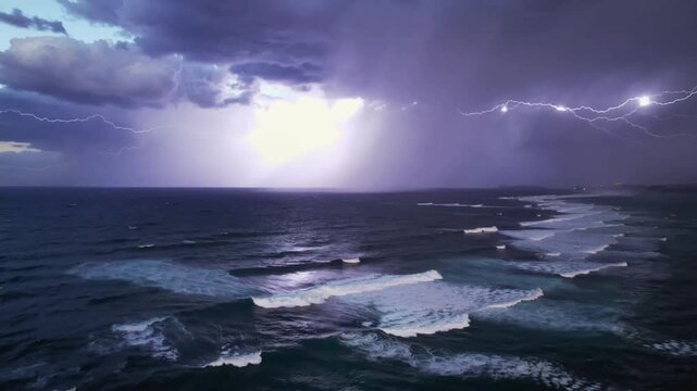 On the distant horizon thunder rumbled lightning flashed intermittently and waves churned