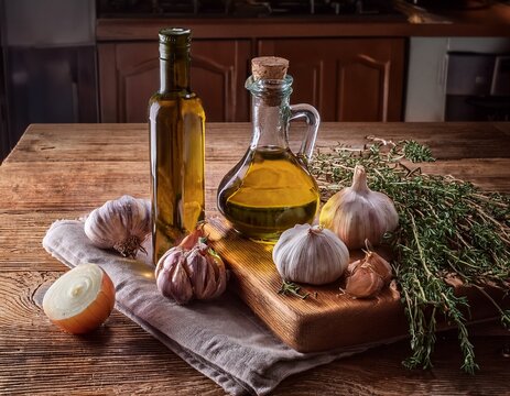 rustic kitchen scene with herbs garlic onions and olive oil on wooden countertop
