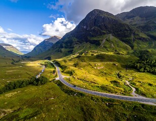 Scenic Highland road winding through lush valleys