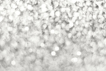 Silver cloud white dancer sparkling glitter bokeh background, abstract defocused texture. Holiday lights. Demonstrating color, trend 2026 year