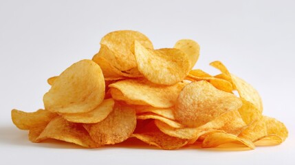 A large pile of golden crispy potato chips is arranged on a plain background. These snacks are perfect for gatherings movie nights or casual munching anytime.