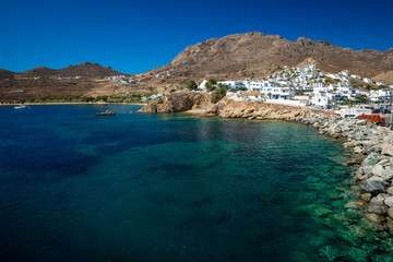 Obraz premium View of Livadi harbour breakwater and Livadakia beach on Serifos from the sea