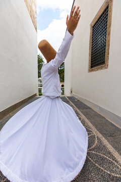 Sufi Whirling Dervish in the Topkapi Palace Garden Photo, Topkapi Palace Istanbul, Turkiye  (Turkey)