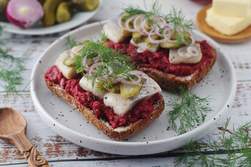 Scandinavian sandwiches with herring and beetroot	