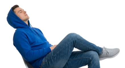 Young man resting in a relaxed pose with an isolated transparent background is displayed in studio