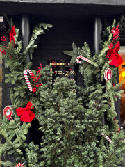 Festive Holiday Decorations with Greenery and Red Accents