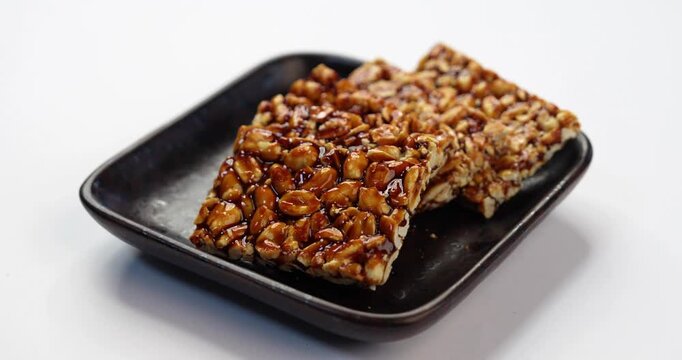 Peanut Jaggery chikki or bar using groundnut or shengdana with gur