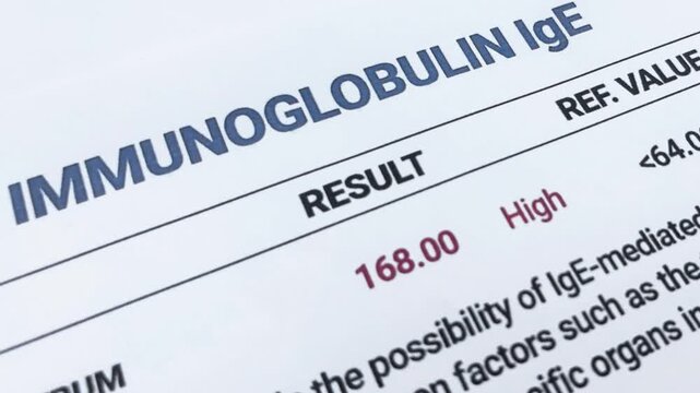 Immunoglobulin IgE medical report result close up 4k footage.