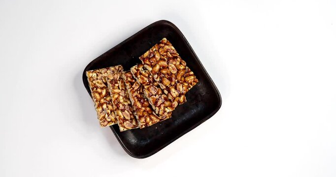 Peanut Jaggery chikki or bar using groundnut or shengdana with gur