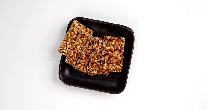 Peanut Jaggery chikki or bar using groundnut or shengdana with gur