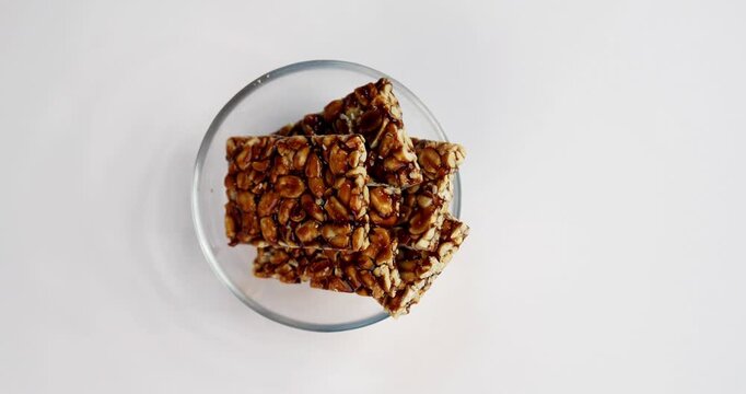 Peanut Jaggery chikki or bar using groundnut or shengdana with gur