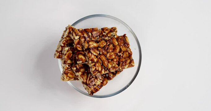 Peanut Jaggery chikki or bar using groundnut or shengdana with gur