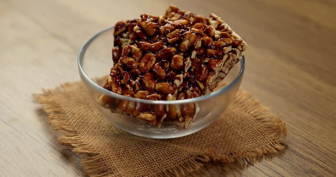 Peanut Jaggery chikki or bar using groundnut or shengdana with gur