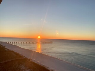 Sunrise over pier