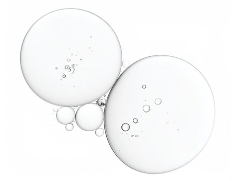 Macro shot of transparent liquid orbs with tiny bubbles, isolated on white background
